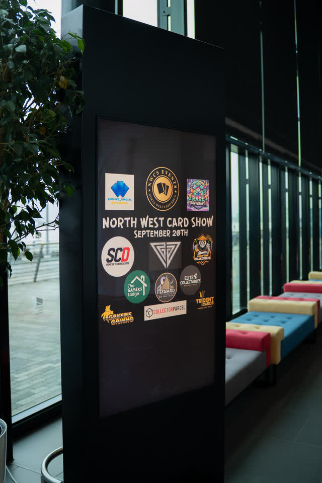 A North West Card Show sign for the September show and its sponsors, just inside the entrance.