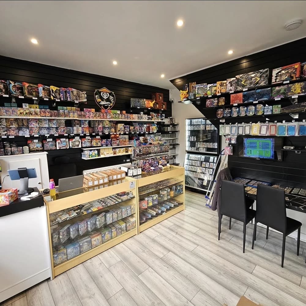 Inside the Radiant-Chain Collectibles shop, walls of sealed product and glass counters